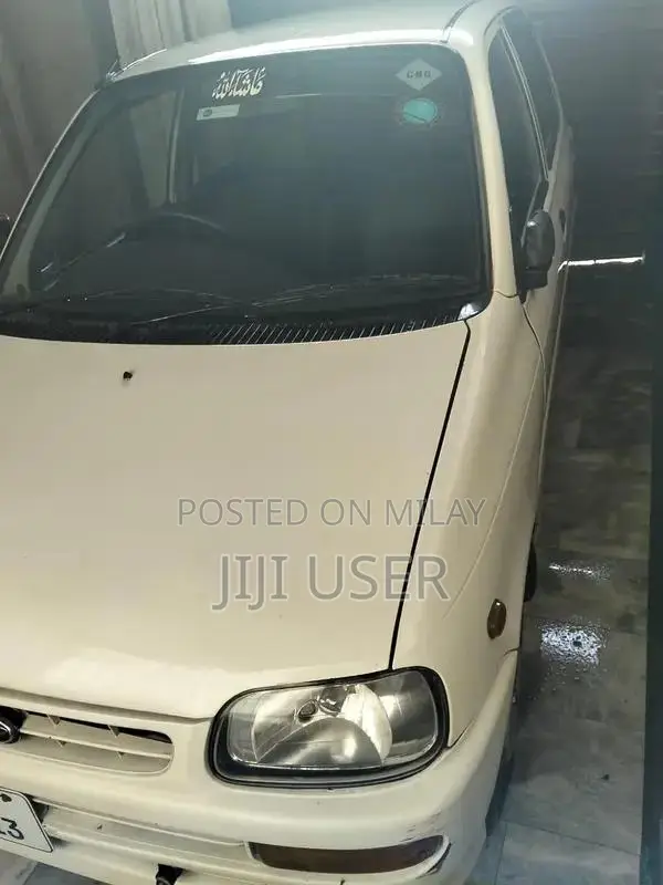 Daihatsu Cuore Compact City Car - Efficient Urban Vehicle