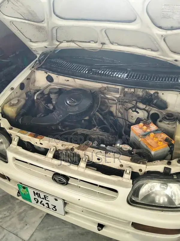 Daihatsu Cuore Compact City Car - Efficient Urban Vehicle