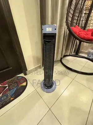 Photo - Portable Electric Room Heater with Rotating Design