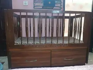 Photo - Spacious Baby Cot with Storage Drawers and Wheels