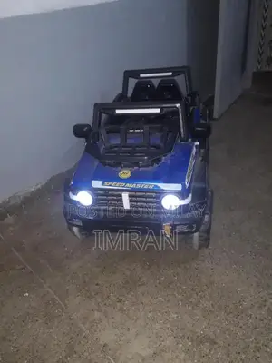 Photo - Kids Battery Operated Ride-On Jeep with Remote Control