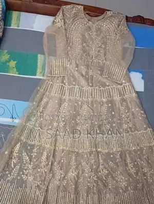 Elegant Net Frock with Stone and Karhai Embellishments