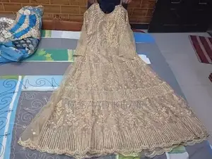 Elegant Net Frock with Stone and Karhai Embellishments