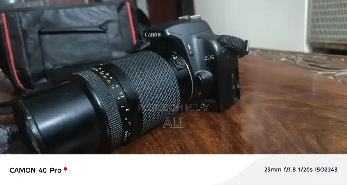 Canon 1000D DSLR Camera with 100-300mm Lens