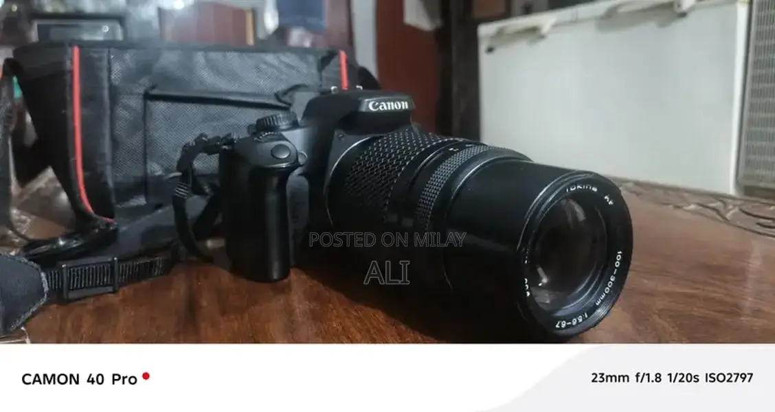 Canon 1000D DSLR Camera with 100-300mm Lens