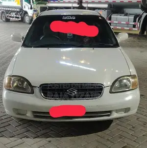 2004 Suzuki Baleno JXR Sedan - Well Maintained White Vehicle
