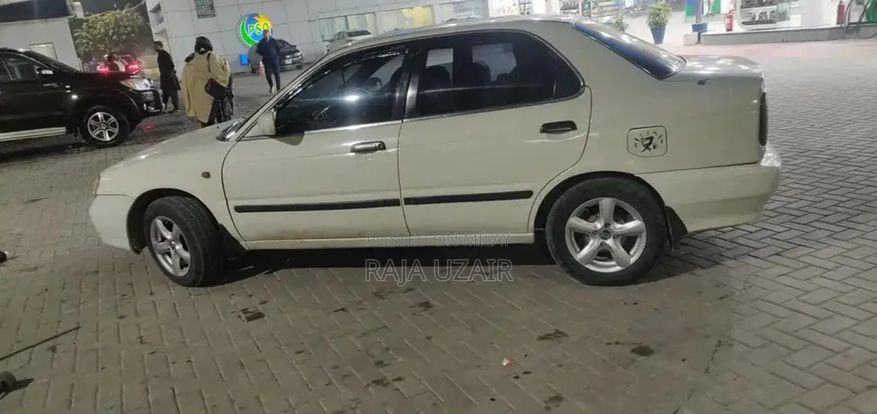 2004 Suzuki Baleno JXR Sedan - Well Maintained White Vehicle