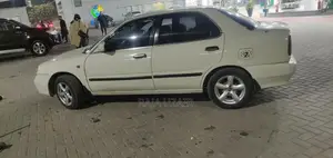 2004 Suzuki Baleno JXR Sedan - Well Maintained White Vehicle