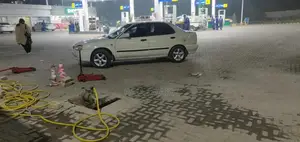 2004 Suzuki Baleno JXR Sedan - Well Maintained White Vehicle