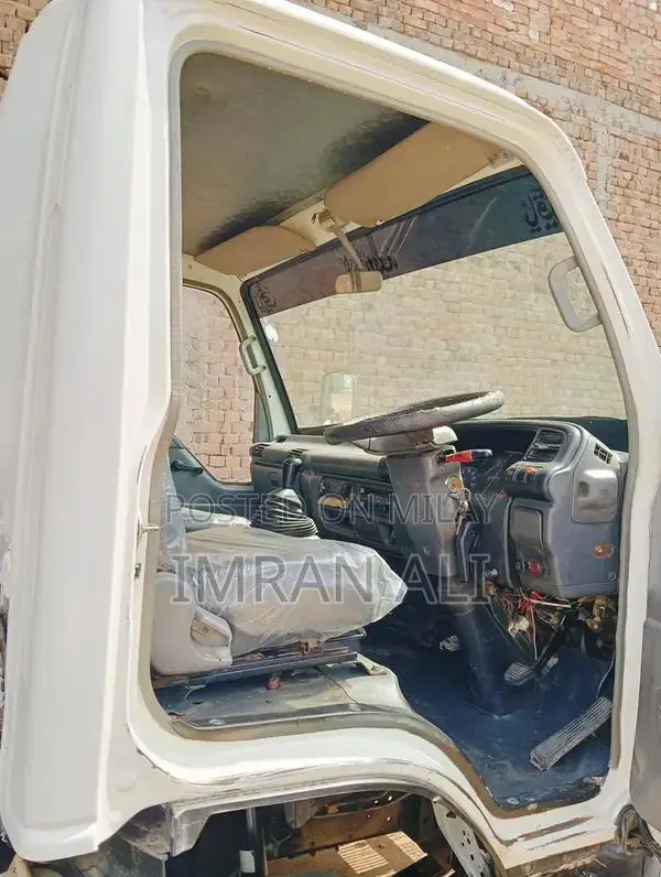 Isuzu NPR Commercial Truck with Gear Transmission and New Tires