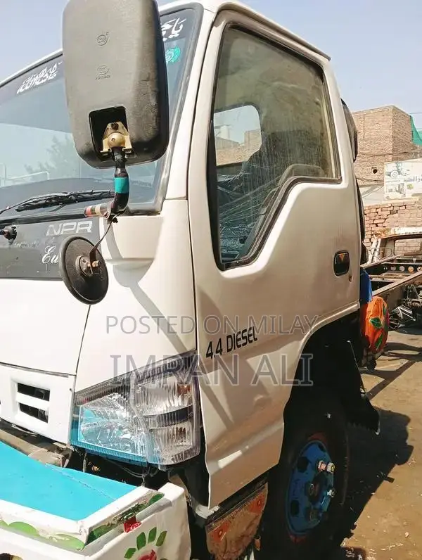 Isuzu NPR Commercial Truck with Gear Transmission and New Tires