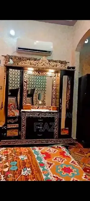 Photo - Complete Bedroom Furniture Set with Bed, Tables, and Dresser