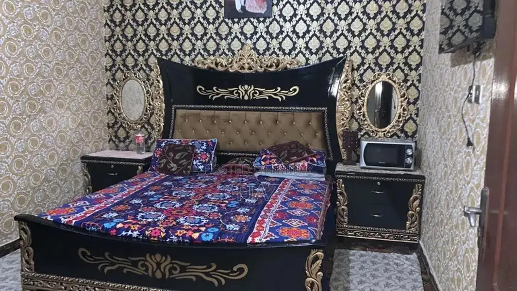 Complete Bedroom Furniture Set with Bed, Tables, and Dresser