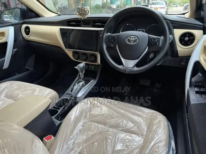 Toyota Corolla Altis 1.6 Sedan 2021 - Low Mileage White Sedan
