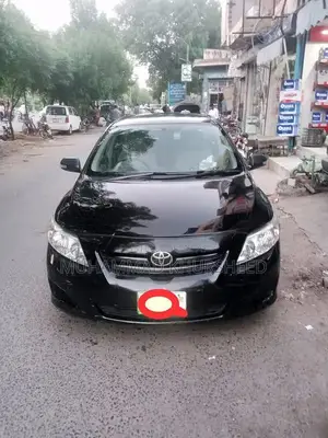 Photo - Toyota Corolla XLI Sedan - Reliable Compact Car