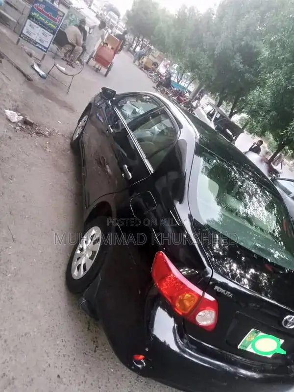 Toyota Corolla XLI Sedan - Reliable Compact Car