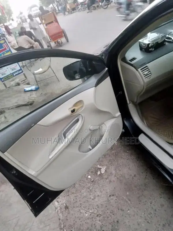 Toyota Corolla XLI Sedan - Reliable Compact Car