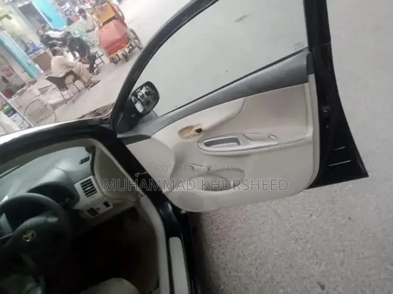 Toyota Corolla XLI Sedan - Reliable Compact Car