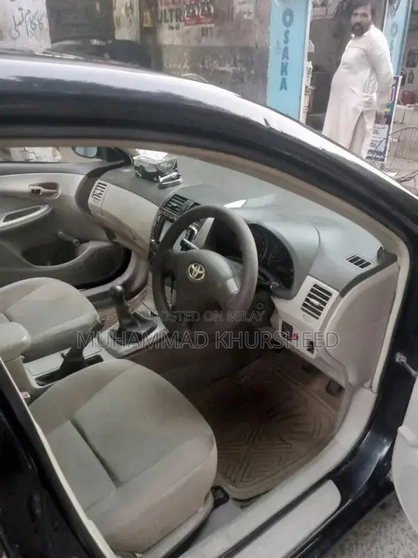 Toyota Corolla XLI Sedan - Reliable Compact Car