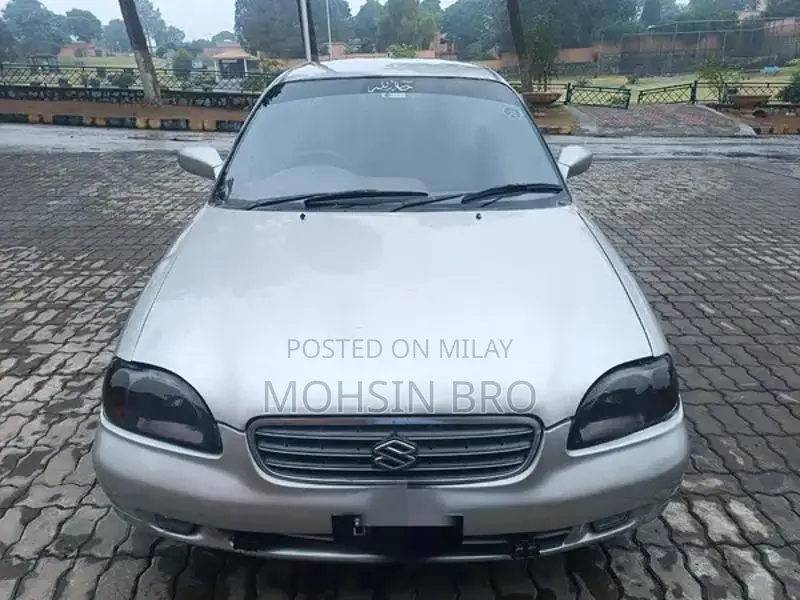 Suzuki Baleno JXL Sedan - Manual Transmission Silver Compact Car