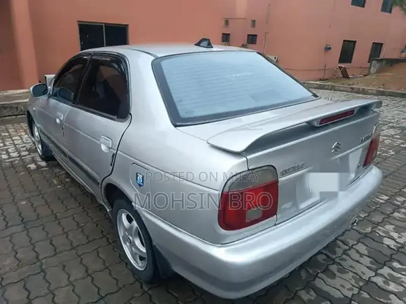 Suzuki Baleno JXL Sedan - Manual Transmission Silver Compact Car