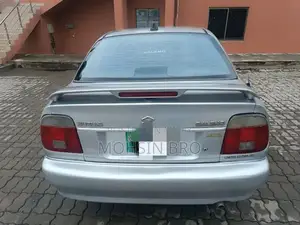 Suzuki Baleno JXL Sedan - Manual Transmission Silver Compact Car