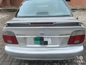 Suzuki Baleno JXL Sedan - Manual Transmission Silver Compact Car