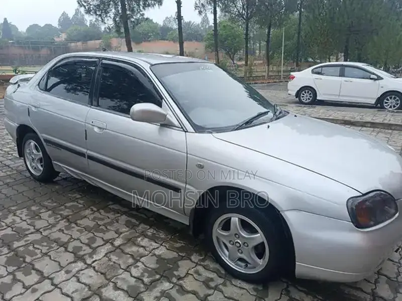 Suzuki Baleno JXL Sedan - Manual Transmission Silver Compact Car