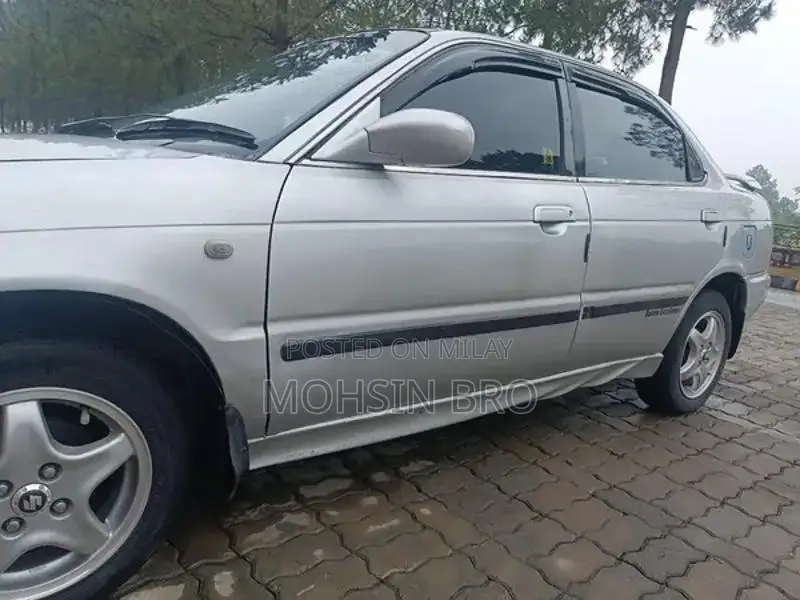Suzuki Baleno JXL Sedan - Manual Transmission Silver Compact Car