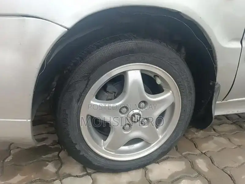 Suzuki Baleno JXL Sedan - Manual Transmission Silver Compact Car