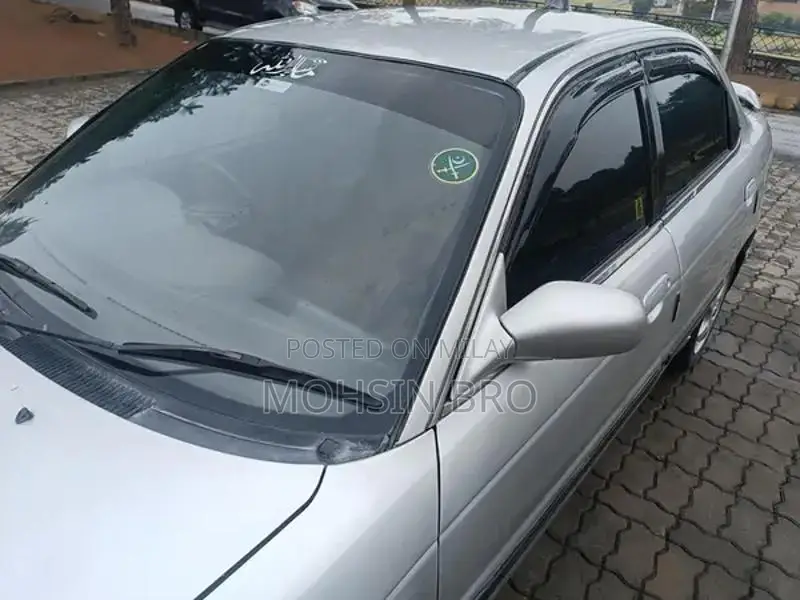 Suzuki Baleno JXL Sedan - Manual Transmission Silver Compact Car