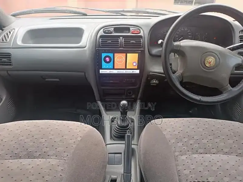 Suzuki Baleno JXL Sedan - Manual Transmission Silver Compact Car