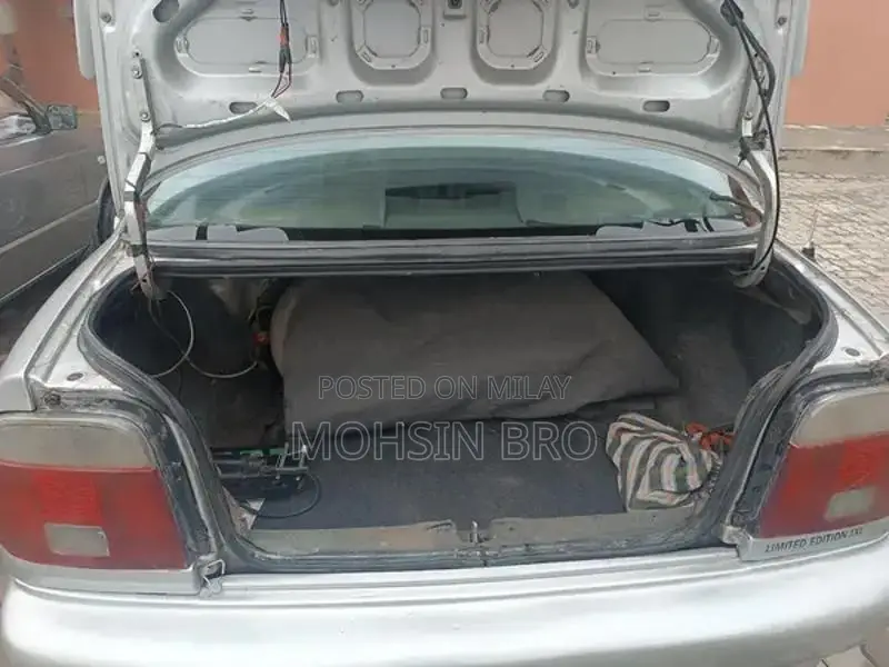 Suzuki Baleno JXL Sedan - Manual Transmission Silver Compact Car