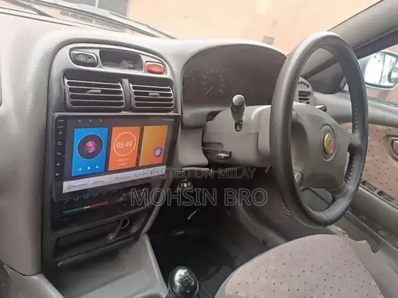 Suzuki Baleno JXL Sedan - Manual Transmission Silver Compact Car