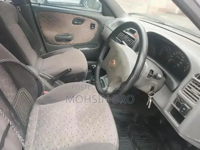 Suzuki Baleno JXL Sedan - Manual Transmission Silver Compact Car