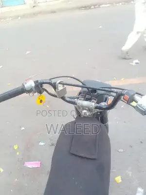 Honda 70cc Motorcycle - Well-Maintained Condition