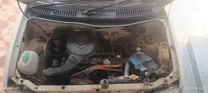 Coure 2002 Sedan - Reliable City Car with Power Steering