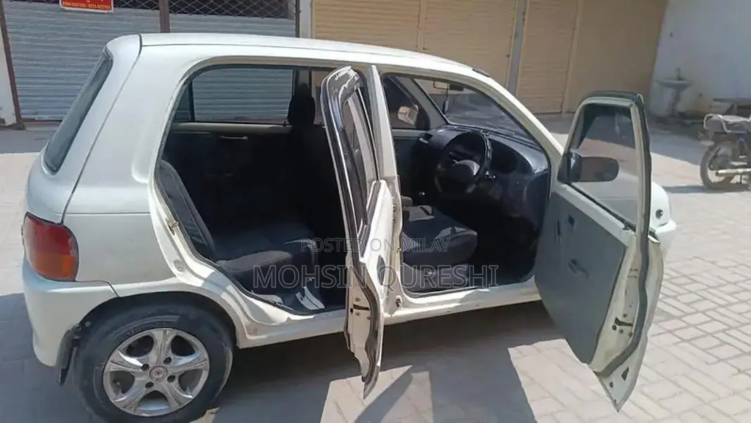 Coure 2002 Sedan - Reliable City Car with Power Steering