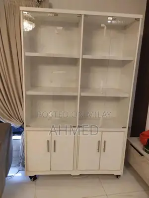 Photo - Versatile White Storage Rack for Books, Shields, and More