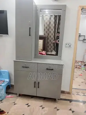 Photo - Wooden Dresser with Color Variations - Home Furniture Piece