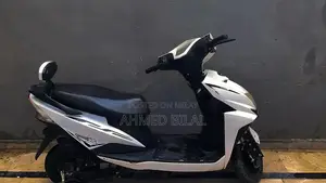 Photo - White Electric Bike with 50km Range and High Speed