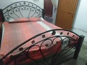Photo - Iron Frame Double Bed with Quality Spring Mattress