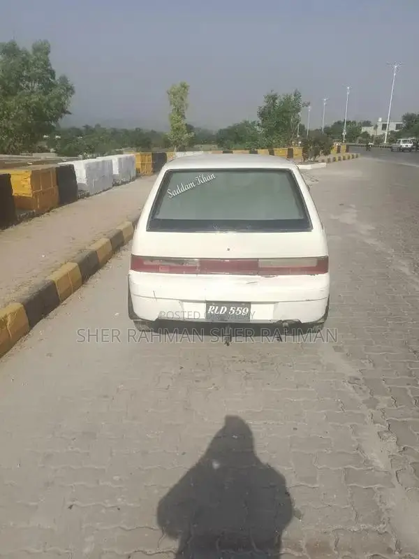 Suzuki Cultus Compact Sedan - Reliable Urban Vehicle