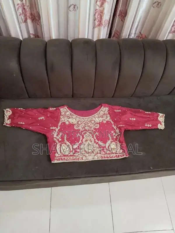 Red Bridal Lehenga with Golden Hand Embroidery and Stones