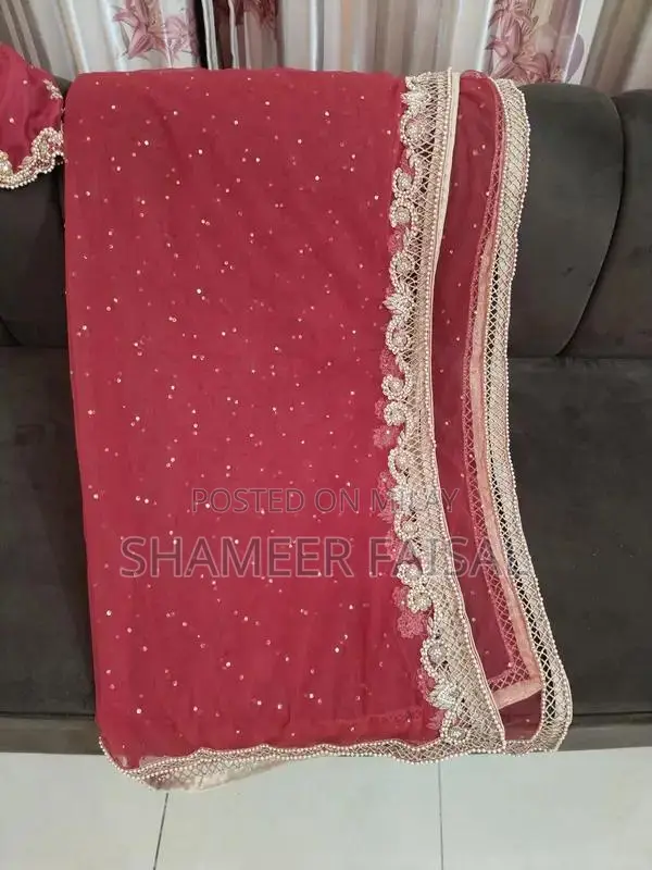 Red Bridal Lehenga with Golden Hand Embroidery and Stones