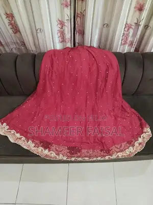 Red Bridal Lehenga with Golden Hand Embroidery and Stones