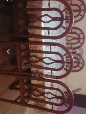 Photo - Wooden 6-Seater Oval Dining Table with Removable Seats and Top