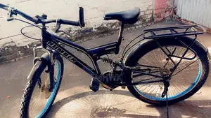Photo - Blue and Black Hummer Cycle with Shock Absorbers