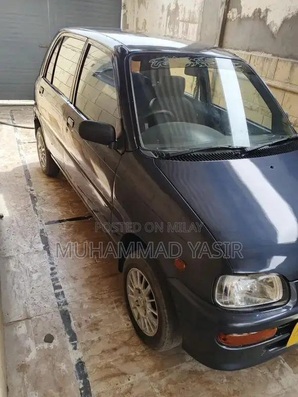 2004 Daihatsu Coure Compact Sedan - Well-Maintained Vehicle