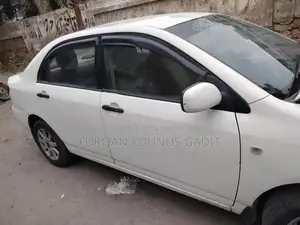 Photo - Toyota Corolla XLi 2006 Sedan - Engine Updated